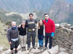 Arrival of the group of hikers at Machu Picchu